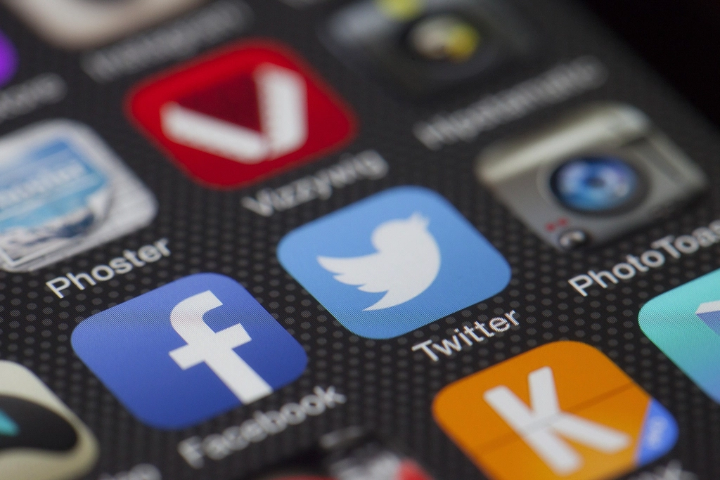 a phone displaying social media