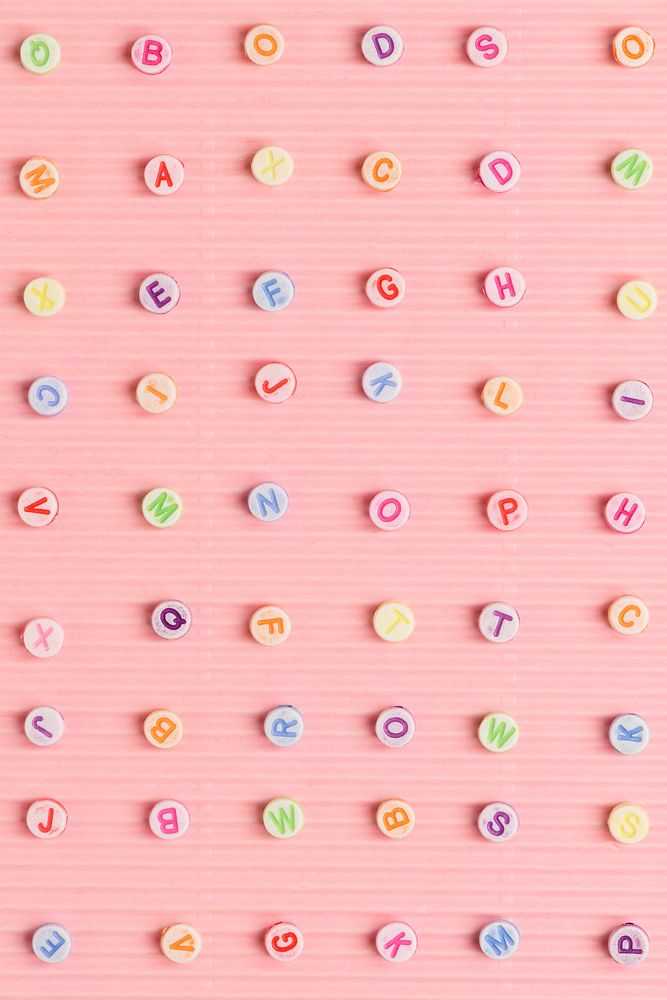 Alphabet beads pattern pink background | Free Photo - rawpixel