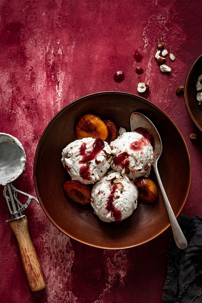 Roasted plums ice cream on red Premium Photo rawpixel