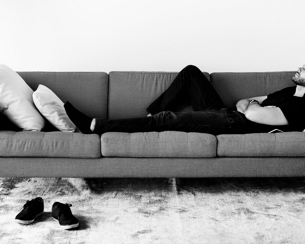Man sleeping on the sofa Free Photo rawpixel