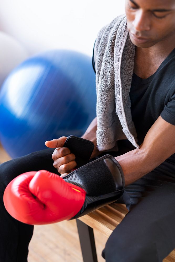 Active man wearing boxing gloves Photo rawpixel