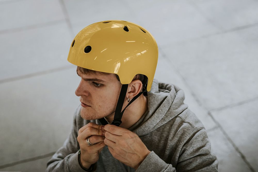 Man wearing yellow skate helmet Premium Photo rawpixel