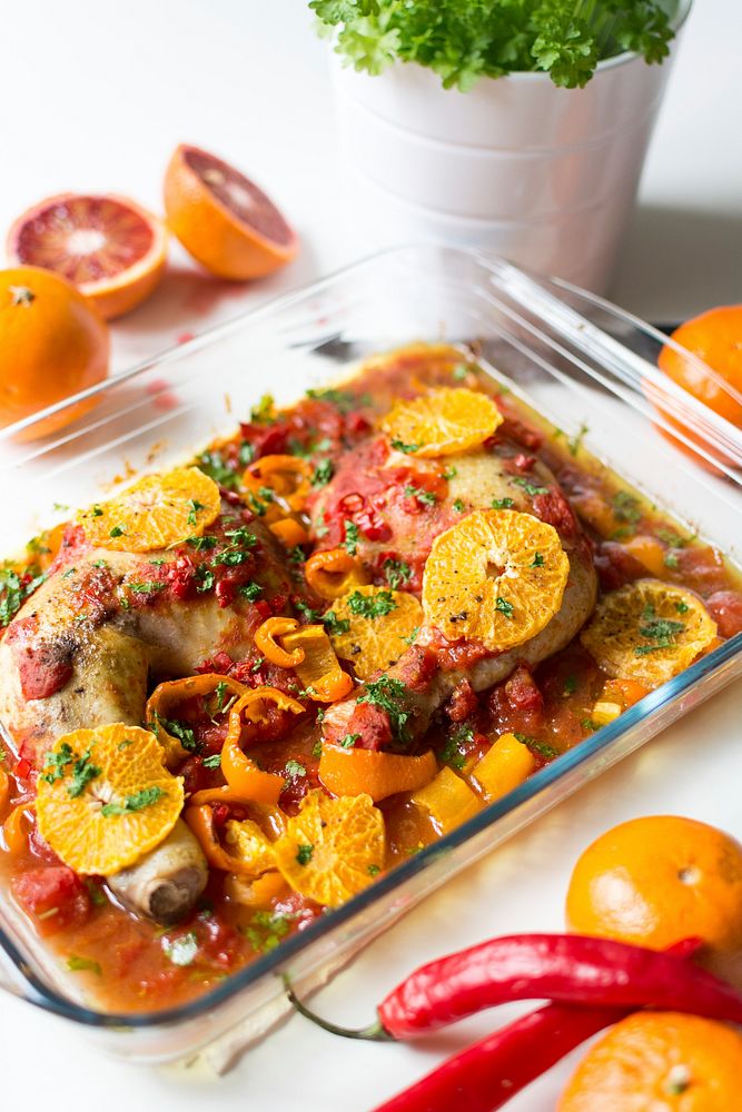 Chicken thighs with tomatoes, peppers, | Free Photo - rawpixel