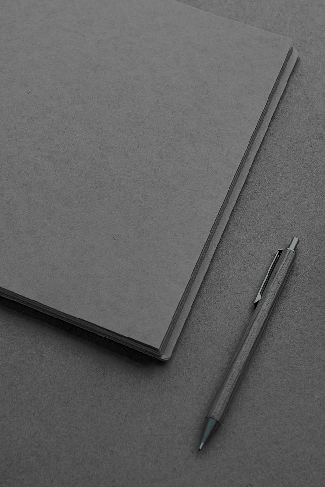 Blank plain black notebook with a pen Premium Photo rawpixel