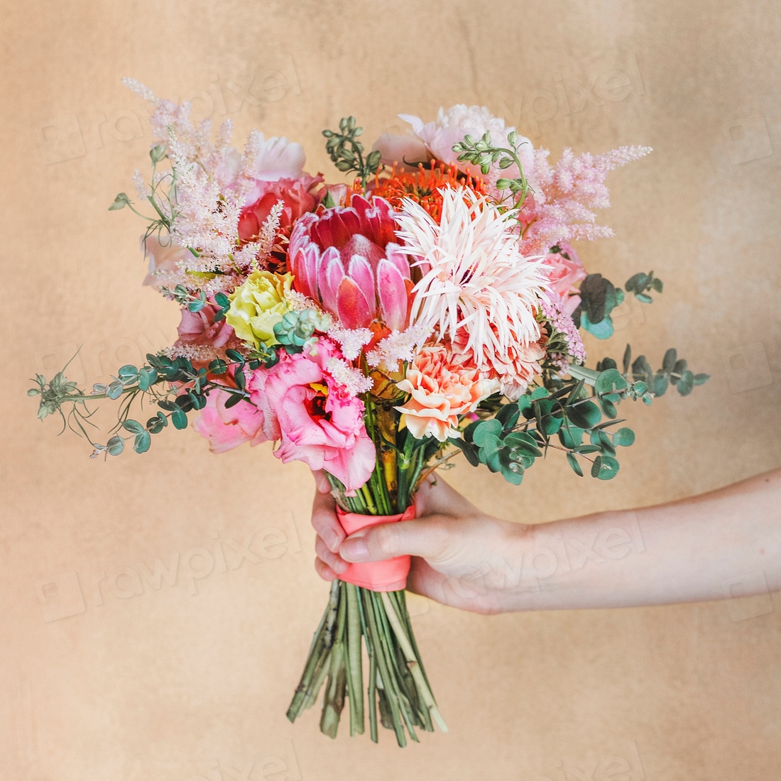 Woman holding a bouquet of flowers | Premium Photo - rawpixel