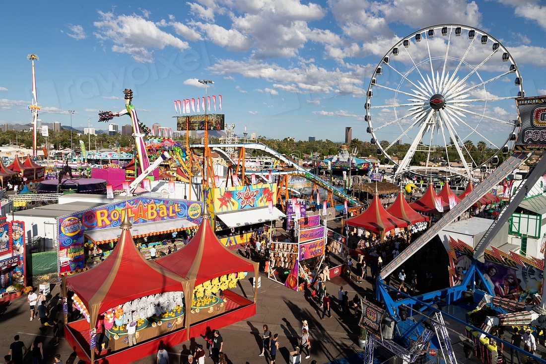 Carnival rides and games, including | Free Photo - rawpixel