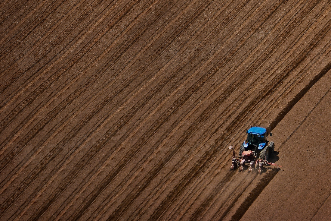 Tractor ploughing soil field background | Free Photo - rawpixel