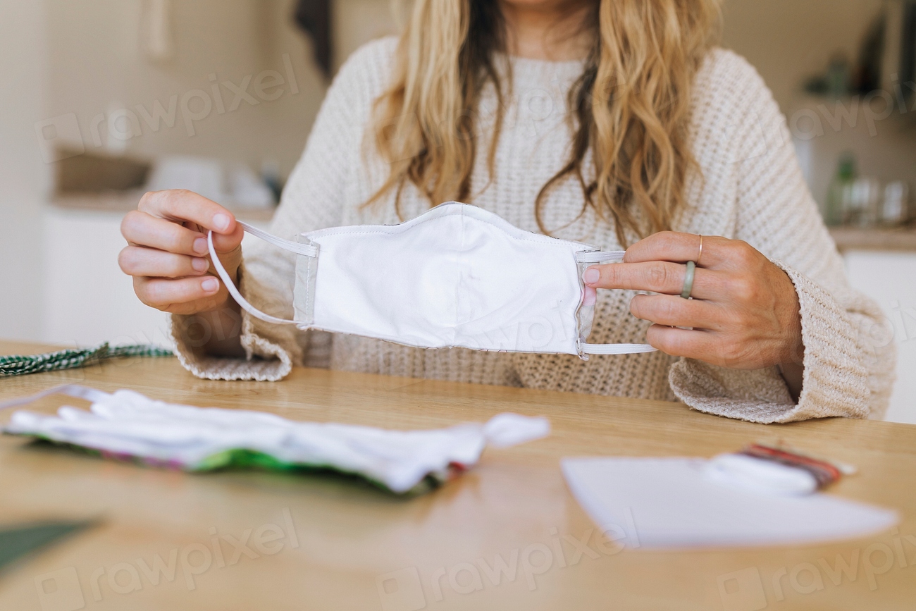 Woman stitching face mask coronavirus Premium Photo rawpixel