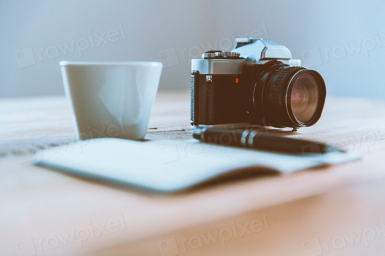 Creative desk camera and notebook | Free Photo - rawpixel