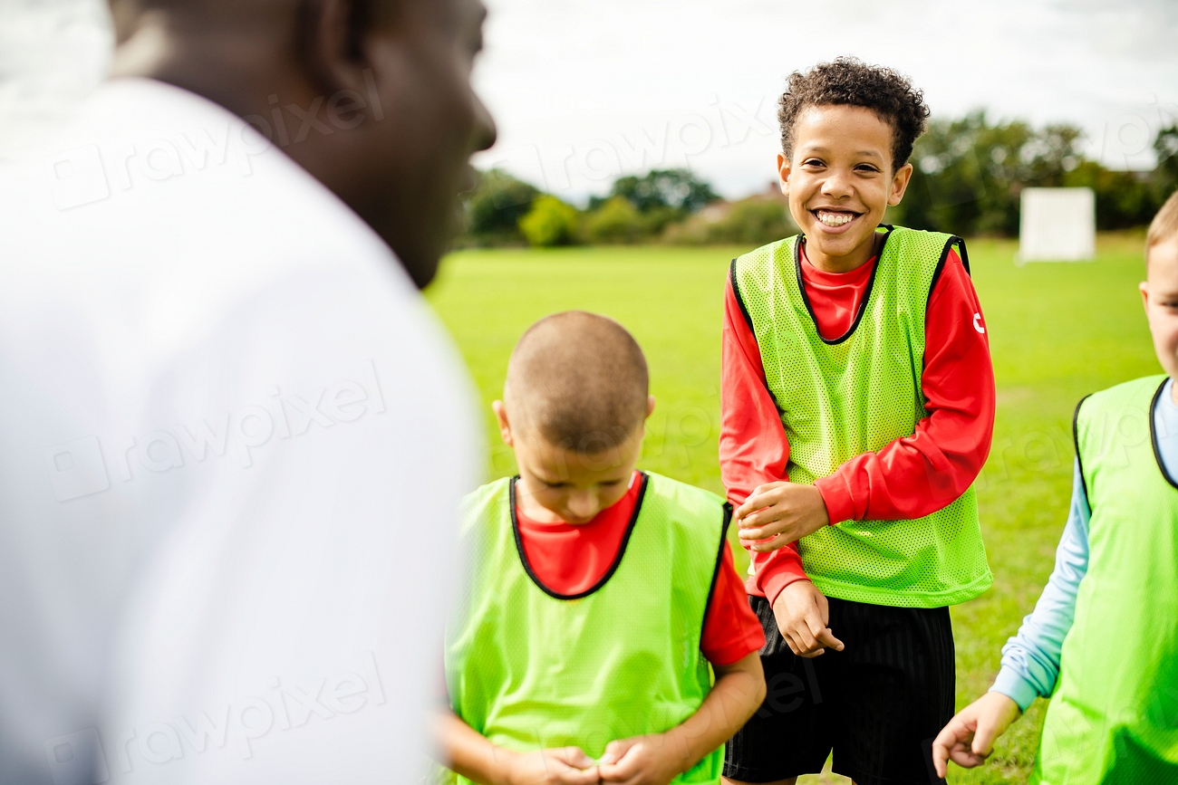 Football coach training his students | Free Photo - rawpixel