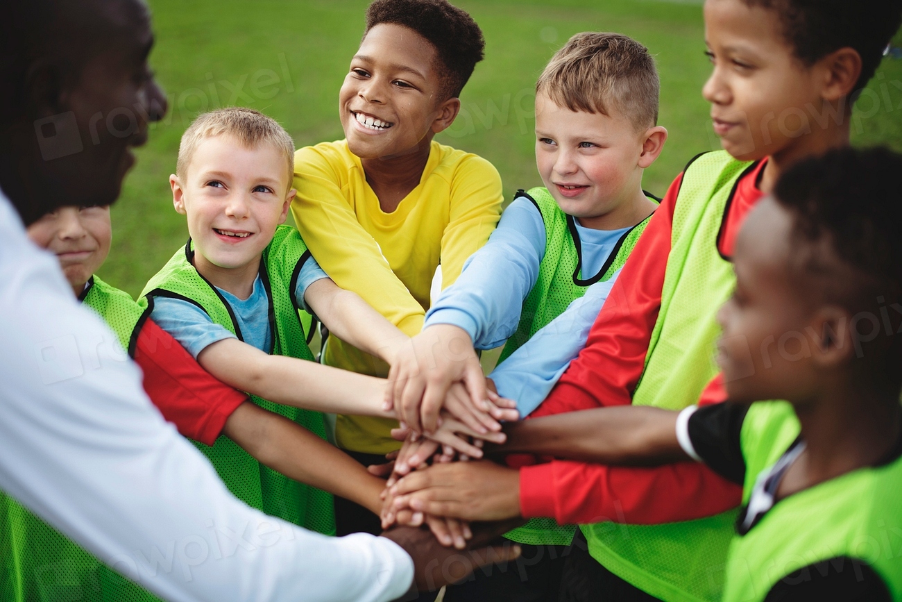 Junior Football Team Stacking Hands | Premium Photo - Rawpixel