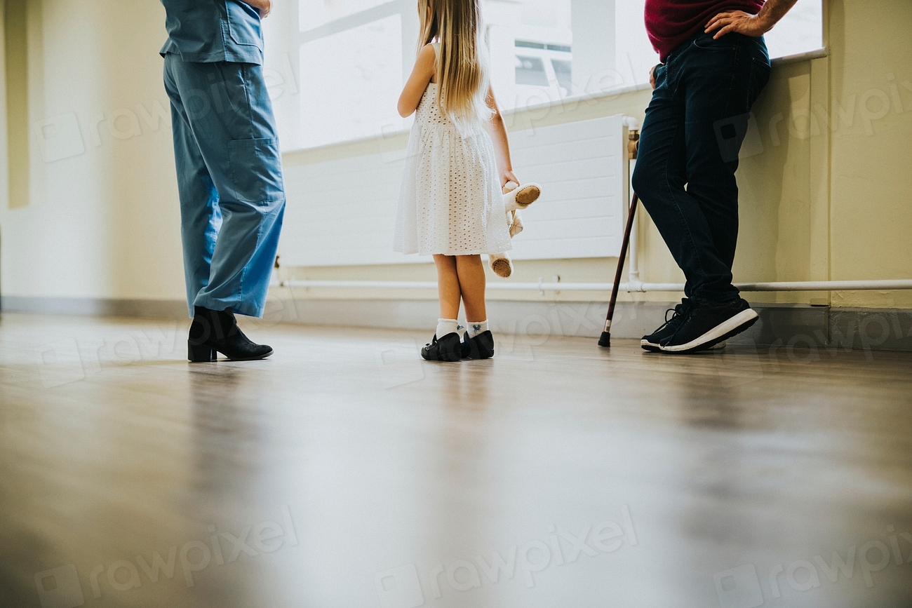 Nurse walking a patient down the hallway | Free Photo - rawpixel