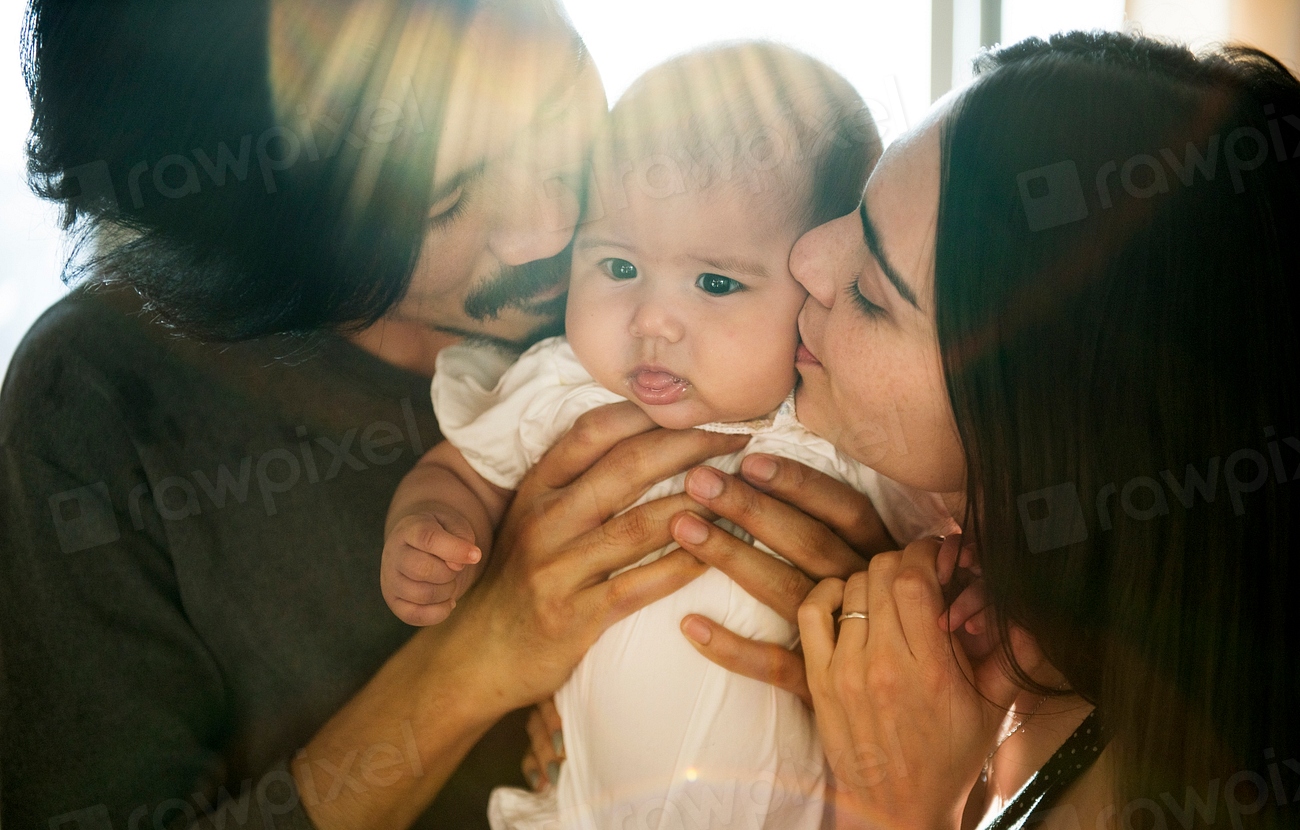 Dad and Mom Kiss Baby | Premium Photo - rawpixel