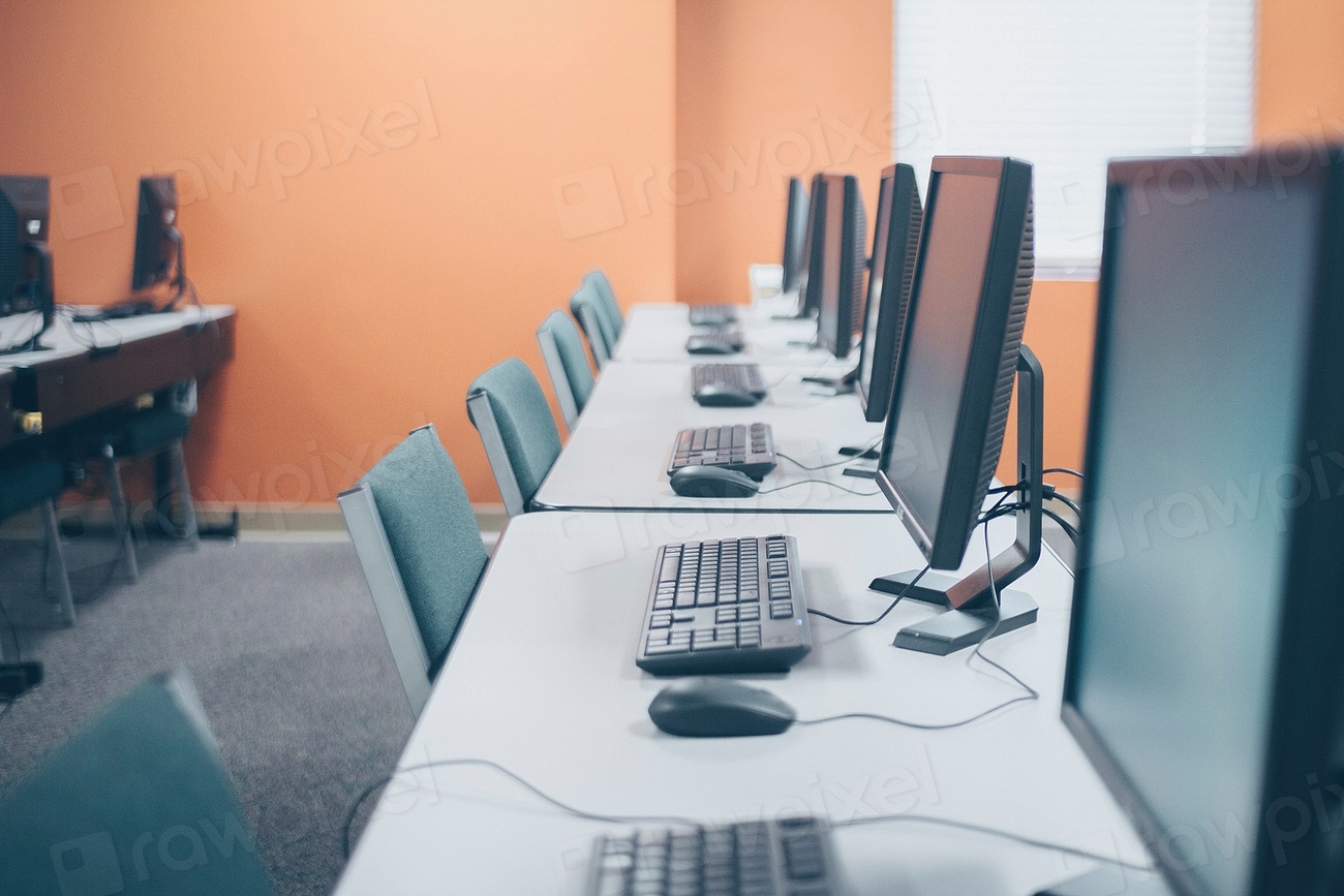 Row of computers at a desk