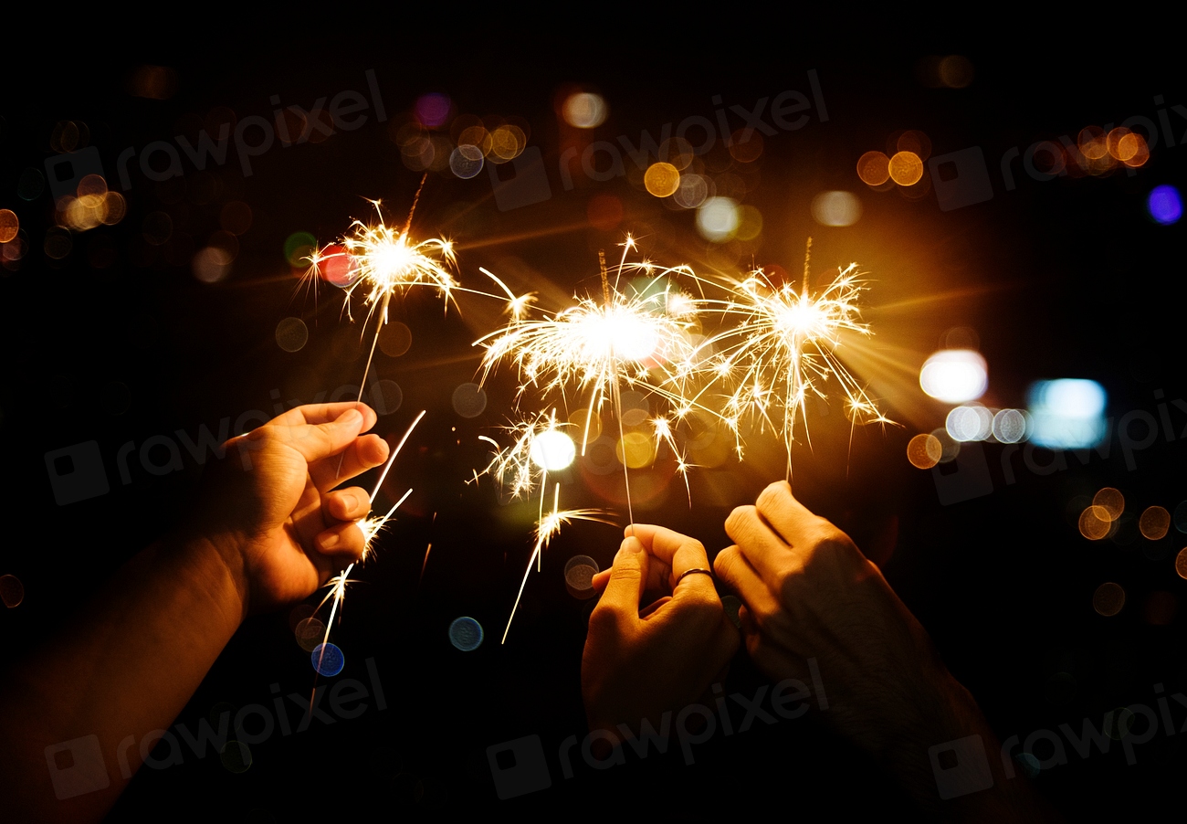 Celebrating with sparklers in the night | Free Photo - rawpixel