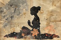 Silhouette woman doing meditation paper painting outdoors.