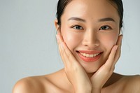 Asian Woman with perfect skin face woman dimples person.