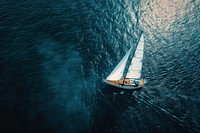 Aerial view of a sailboat in open seas transportation recreation outdoors.
