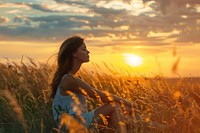 Woman at sunset relaxing photo photography grassland.