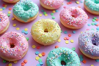 Rainbow donut sprinkle background sprinkles confectionery dessert.