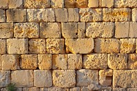 Limestone wall architecture building symbol.