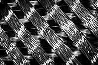 Carbon paper texture pattern weaving.