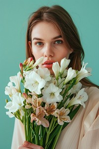 Woman with beautiful bouquet of freesia flowers photo photography portrait.