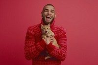 Hispanic man holding cat surprised laughing wildlife.