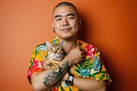Hispanic man hug cat portrait photography accessories.