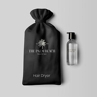 Hair dryer drawstring pouch and pump bottle flat lay