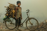 Poverty kid cycling transportation outdoors bicycle.