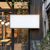 Blank light box sign mockup electronics indoors planter.