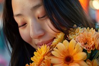 Cheerful asian woman smell a big flower buquet in hand photo photography asteraceae.