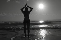Yoga silhouette photography beach shoreline outdoors.
