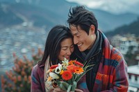 Bhutanese couple giving flower photo photography portrait.