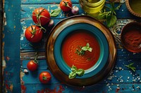 Traditional Spanish gazpacho soup cookware ketchup plate.