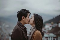 Bhutanese couple kissing together romantic person female.
