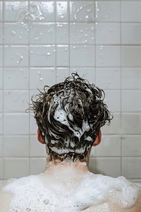 Man washing hair in the bathroom bathing wedding female.