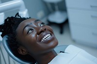Black woman mouth open sitting on dentist chair laughing person female.