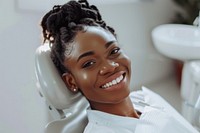 Black woman smile sitting on dentist chair dimples wedding person.