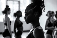 Black girl study at ballet class with teacher recreation sweating dancing.