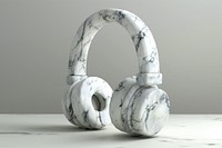 Marble headphones sculpture electronics football headset.