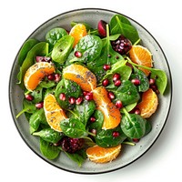 Mandarine Pomegranate Spinach Salad with Poppy Seed Dressing vegetable produce plate.