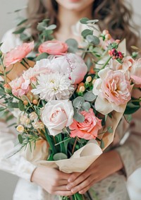 A photo of an eucalyptus and pink peony flower bouquet rose graphics blossom.