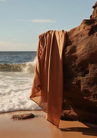 Towel mockup beach water rock.
