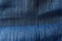 Denim fabric texture clothing apparel pants.