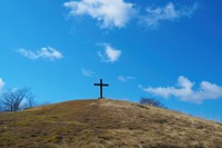 Cross on the hill sky graveyard outdoors.