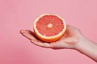 Half of a grapefruit produce orange pomelo.