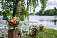 A beautiful outdoor wedding ceremony outdoors flower chair.