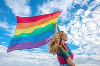 Celebrating Gay Pride woman flag female.